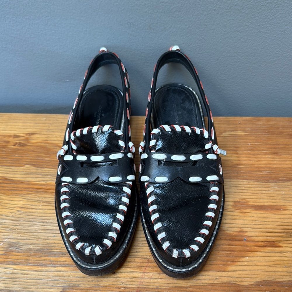 Stylish Black Loafers with Red and White Accents